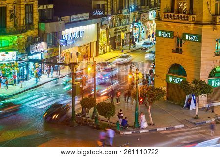 Cairo, Egypt - December 23, 2017: The Fast Moving Cars At Night In Talaat Harb Square, The Center Of