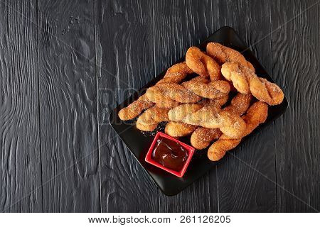 Homemade Twisted Korean Doughnuts - Kkwabaegi Sprinkled With Sugar And Served With With Chocolate Sa