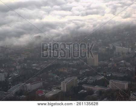 Down Town In Green Mountains With Clouds Above It