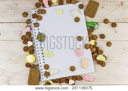 Notepad And Traditional Dutch Candy For Celebration Of Sinterklaas Holiday