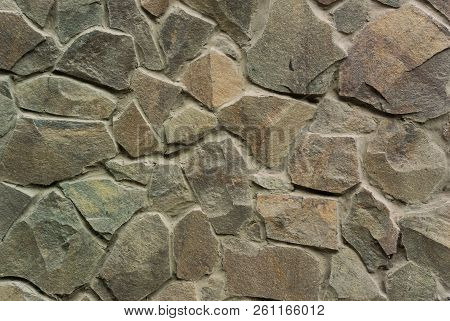 Photo Of Wall Texture From Decorative Stones On Cement Mortar
