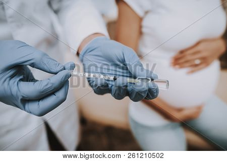 Pregnant Woman. Prepar To Inject. Consultation. Hospital. Childbirth. Belly. Fan. Smiling. Clinic. G