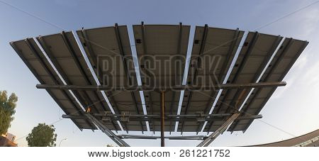 Urban Photovoltaic Panel With Solar Tracker Placed Outdoors Building. Back Devices