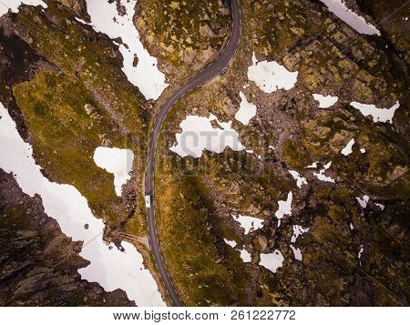 Aerial View. Norway Landscape. Road With Camper Cars In Stony Rocks Mountains. Norwegian National To