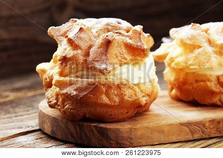 Cream Puffs. Homemade Pastry Cream Puff On Wood