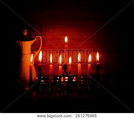 Hanukkah Is A Jewish Holiday. Burning Chanukah Candlestick With Candles. Jug Of Oil. Chanukiah Menor