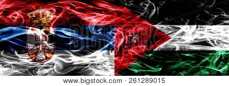 Serbia Vs Jordan, Jordanian Smoke Flags Placed Side By Side. Thick Colored Silky Smoke Flags Of Serb