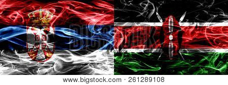 Serbia Vs Kenya, Kenyan Smoke Flags Placed Side By Side. Thick Colored Silky Smoke Flags Of Serbian 