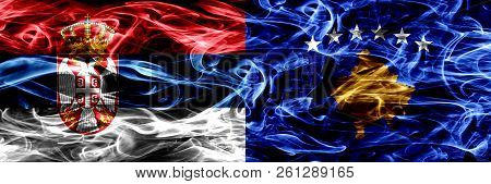 Serbia Vs Kosovo, Serbia Smoke Flags Placed Side By Side. Thick Colored Silky Smoke Flags Of Serbian