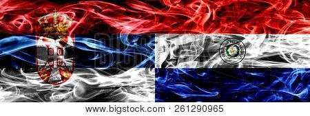 Serbia Vs Paraguay, Paraguayan Smoke Flags Placed Side By Side. Thick Colored Silky Smoke Flags Of S
