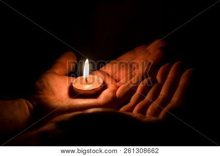 Burning Candle On The Palm, Close Up