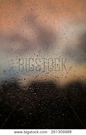 Drops Of The Rain On The Window Glass. Wet Background