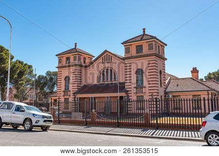 De Aar, South Africa, August 6, 2018: The Town Hall In De Aar In The Northern Cape Province. Vehicle