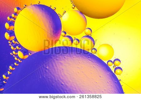 Abstract Background With Colorful Gradient Colors. Oil Drops In Water Abstract Psychedelic Pattern I