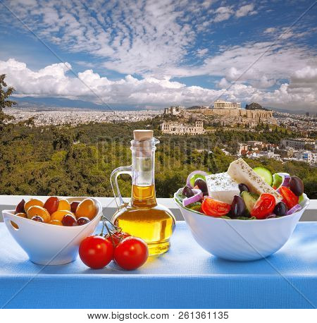 Famous Acropolis With Greek Salad In Athens, Greece
