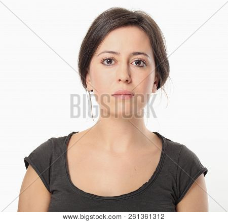 Young Woman Wearing In T-shirt Isolated On White