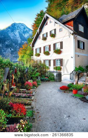 Scenic View Of Famous Hallstatt Mountain Village With Hallstatter Lake.typical Austrian Alpine House