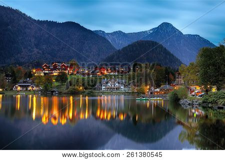 Dramatic And Picturesque Scene At Evening Lake Grundelsee. Mirror Reflection. . Location: Resort Gru