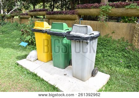Garbage Can Set Of Green, Yellow And Gray Color.