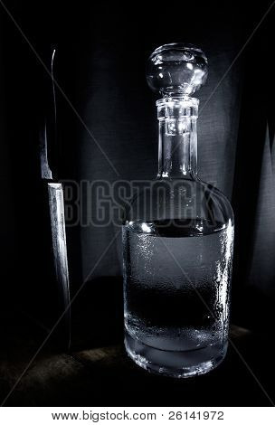 Studioaufnahme Flasche und Messer