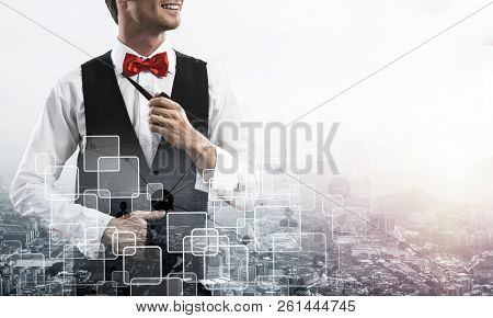 Double Exposure Of Confident And Young Businessman In Smart-casual Wear Smoking Pipe And Modern City