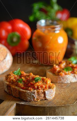 Homemade Vegetable Salad And Bread On Wooden Table