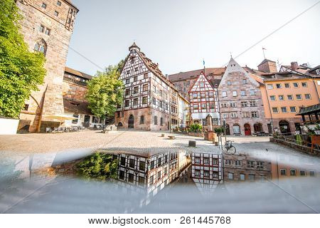 Morning View On The Beautiful Half-timbered Houses With Reflection In The Old Town Of Nurnberg, Germ