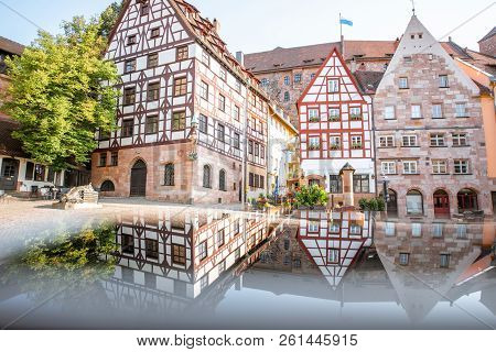 Morning View On The Beautiful Half-timbered Houses With Reflection In The Old Town Of Nurnberg, Germ