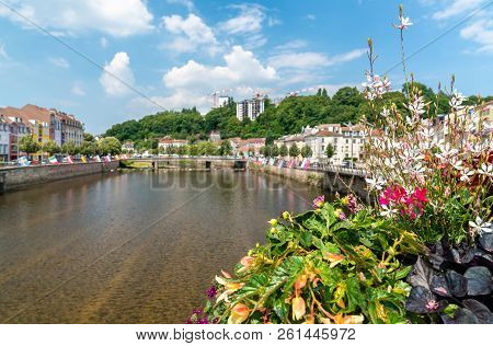 Flowers On A Bridge Across The Moselle River In Epinal, The Vosges Department Of France