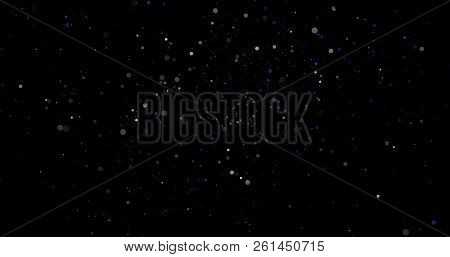 Flying Dust Particles On A Black Background