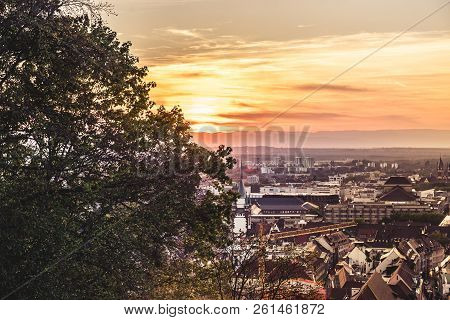 View From Schlossplatz Over The Panorama Of Freiburg At Sunset