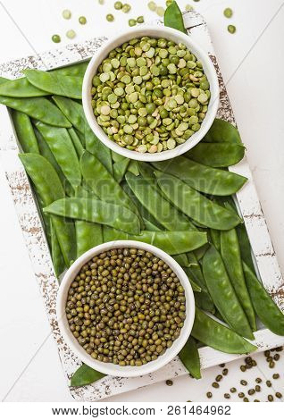 Bowl Of  Mung Beans And Split Peas With Raw Organic Mangetout In Vintage Wooden Box On White Kitchen