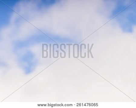 Background Of Blue Sky With White Clouds.