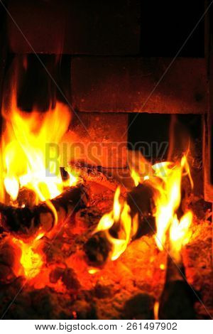 Fire Starts To Die Inside The Fireplace As All The Wood Has Been Burnt.