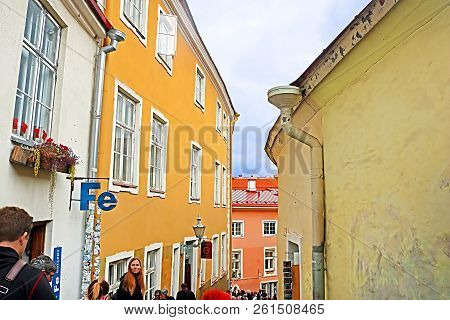 Tallinn, Estonia - August 30, 2018: Unidentified People On Short Leg Street In Old Town. This Street