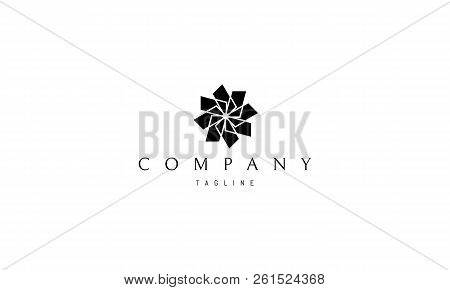 On The Logo Is An Abstract Image Of A Flower.