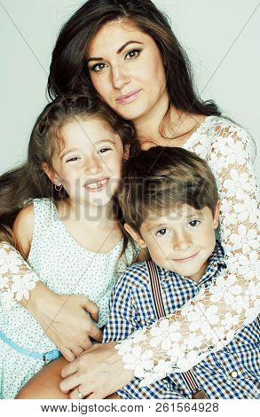 Young Mother With Two Children On White Background, Happy Smilin