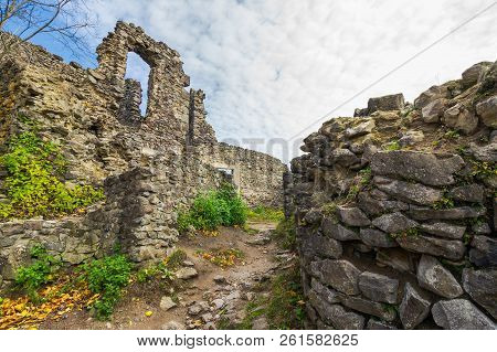 Inner Courtyard Of Nevytsky Castle Ruins. Popular Tourist Destination In Ukraine. Beautiful Autumn W
