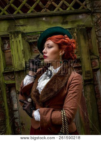 Beautiful Woman Face In The Hat And Red Hair With Sad Eyes - Countess
