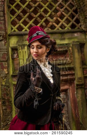 Beautiful Woman Face In The Hat And Red Hair With Sad Eyes - Countess