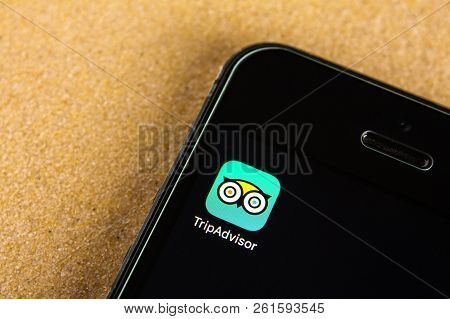 Moscow, Russia- 24 July 2018: Tripadvisor Application Icon On Smartphone Screen. Smartphone Lies On 