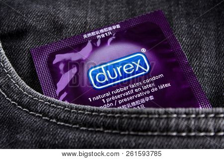 Moscow, Russia- 25 July 2018: Condom Durex Elite Lies In The Front Pocket Of Black Jeans. Editorial 