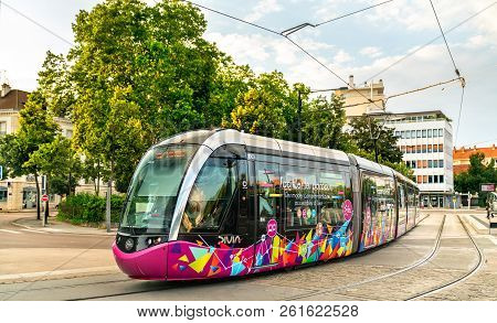 Dijon, France - July 7, 2018: Modern City Tram Alstom Citadis 302 On Place De La Republique. The Dij