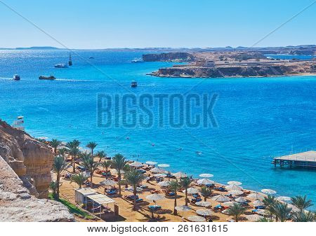 The Comfortable Sand Beach With Sunshades And Palm Trees, Sharm El Maya District, Sharm El Sheikh, S