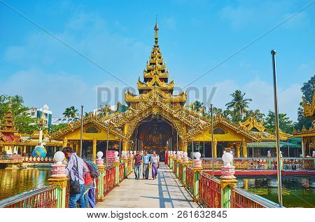 Yangon, Myanmar - February 27, 2018:  The Main Shrine Of Kyay Thone Pagoda (bronze Buddha Image) Wit
