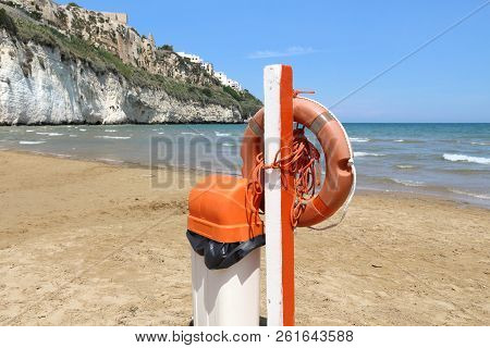 Gargano National Park In Italy - Pizzomunno Beach In Vieste. Life Buoy Equipment.