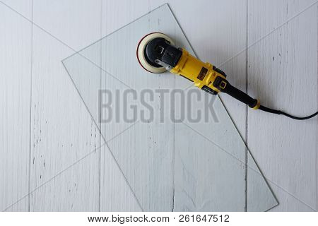 Polishing, Smoothing, Grinding Services White And Grey Background With Grinder Machine And Glass