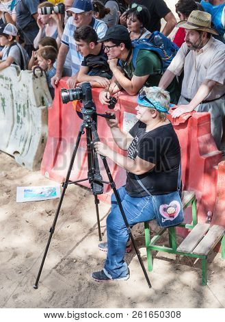 Jerusalem, Israel, September 29, 2018 : Photographer Takes Video Of The Action At The Annual Festiva