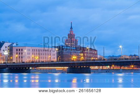 Latvian Academy Of Sciences, Stone Bridge And River Daugava At Night, Riga, Latvia