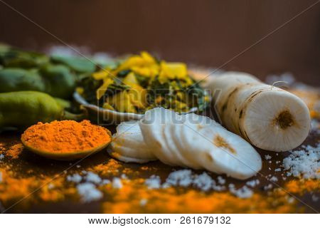 Close Up Of Popular Indian & Asian White Radish Salad Or Muli Ka Smabara On Wooden Surface With Whit